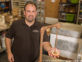 Carlo Bacci making a CB Stuffer peanut butter cup.